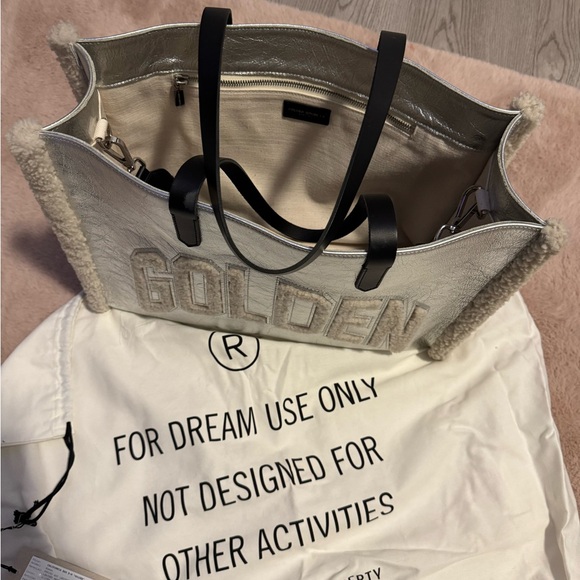 Golden Goose Silver Tote Bag for Sale
Elevate your style with this stunning bag - Picture 2 of 4